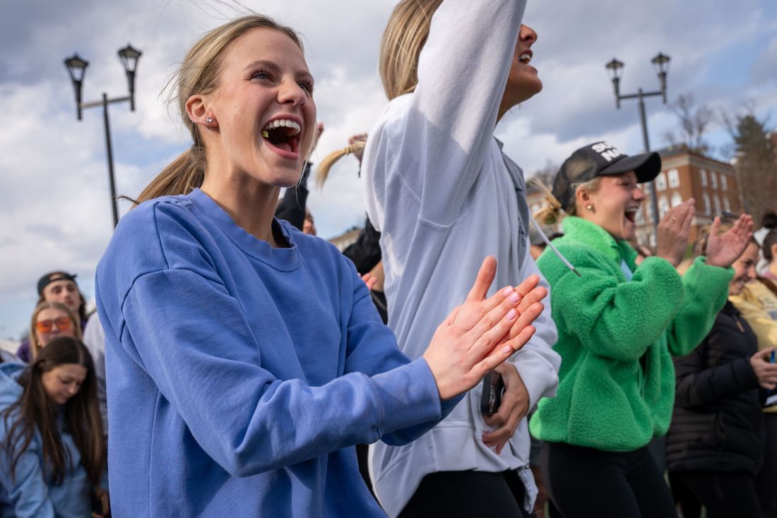 WVU Students cheering on their classmates at a Greek Week event